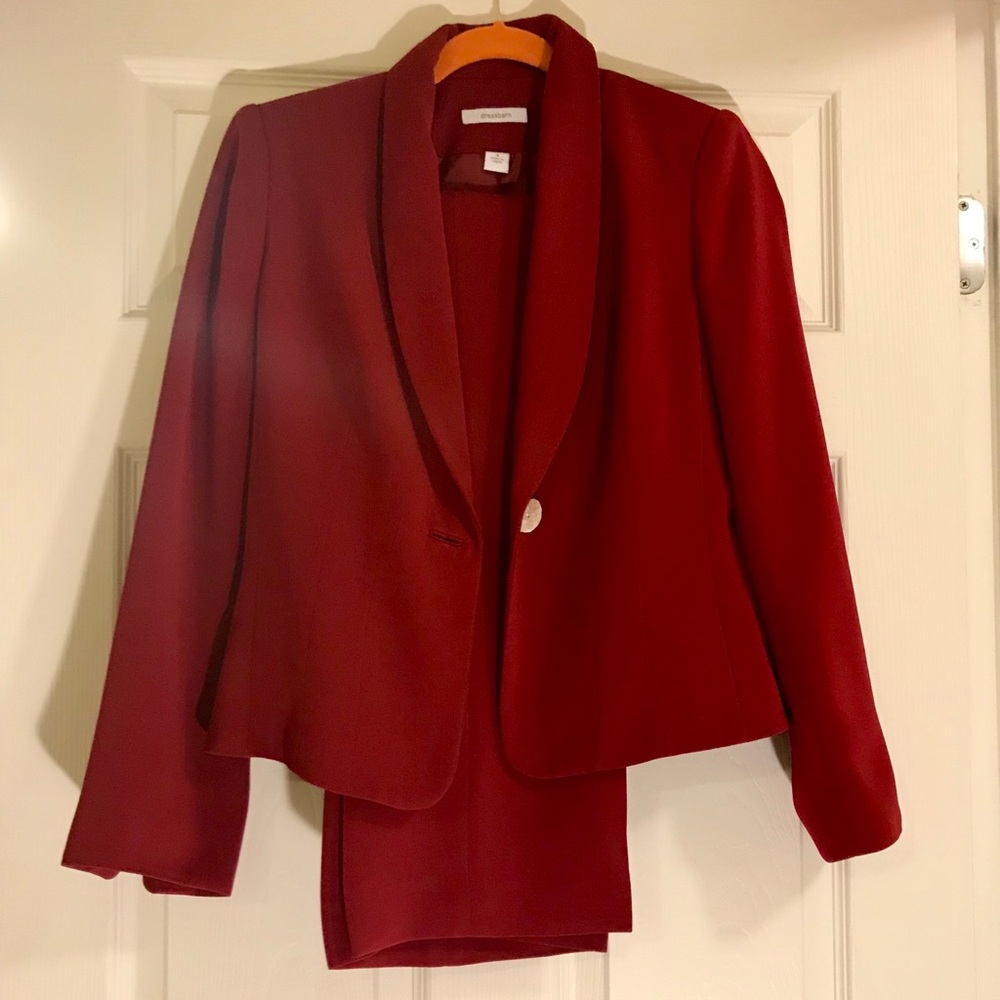 Red business suit.